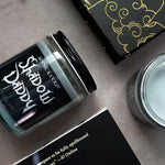 shadow daddy candlewith books that inspired the scent